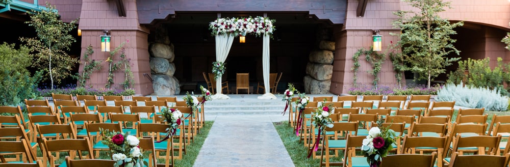 Chairs arranged on lawn facing an altar