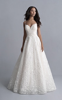 A woman wearing the Tiana wedding gown from the 2020 Disney Fairy Tale Weddings Platinum Collection