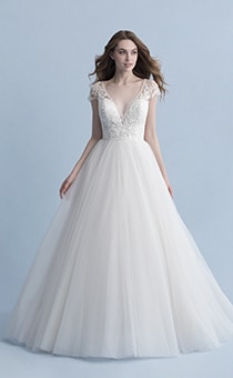 A woman wearing the Cinderella wedding gown from the 2020 Disney Fairy Tale Weddings Collection