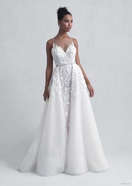 A woman dressed in the Tiana wedding gown from the 2021 Disney Fairy Tale Weddings Platinum Collection