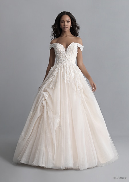 A woman wearing the Belle wedding gown from the 2020 Disney Fairy Tale Weddings Platinum Collection