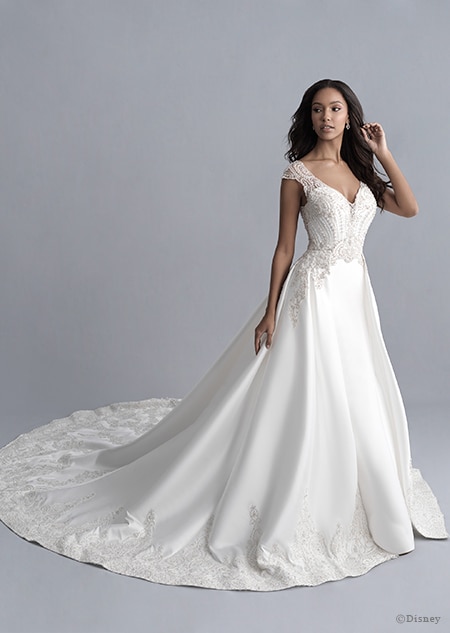 A woman wearing the Jasmine wedding gown from the 2020 Disney Fairy Tale Weddings Platinum Collection A woman wearing the Jasmine wedding gown from the 2020 Disney Fairy Tale Weddings Platinum Collection