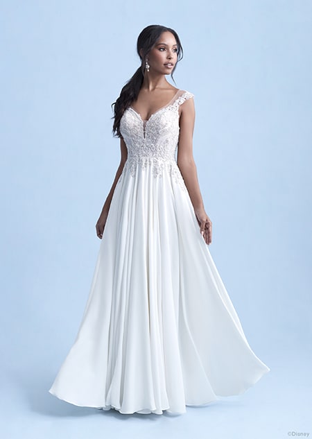 A woman wearing the Jasmine wedding gown from the 2021 Disney Fairy Tale Weddings Collection