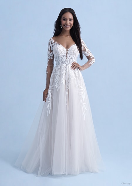 A woman wearing the Pocahontas wedding gown from the 2021 Disney Fairy Tale Weddings Collection