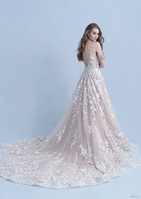 A back side view of a woman in the Snow White wedding gown from the 2021 Disney Fairy Tale Weddings 