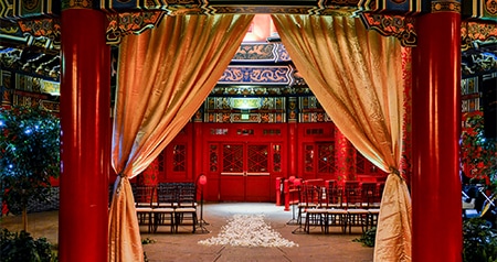 Rows of chairs set up for a wedding at the China Pavilion in Epcot