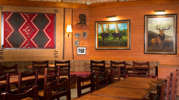 A rustic dining area at Disney's Sequoia Lodge in Paris