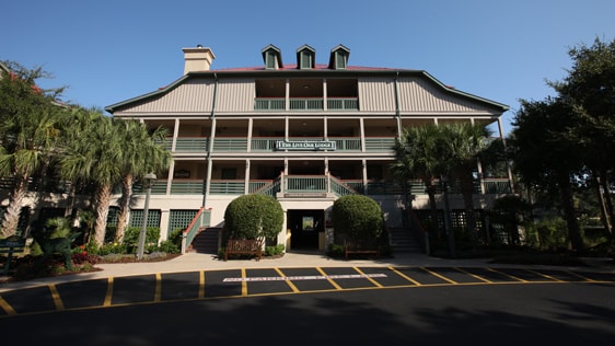 A parking area outside The Live Oak Lodge at Disney's Old Key West Resort