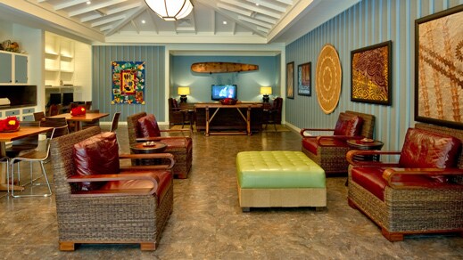 Tables and chairs in a lounge area in the family activities room